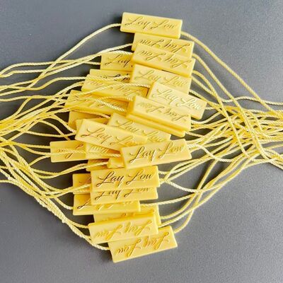 Embossed Plastic Tag Fastener Eco Friendly Durable Plastic Texture Ideal for Secure Labeling Applications