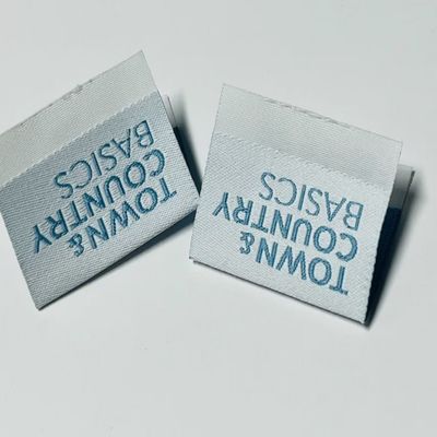 Disesuaikan menjahit pada label tenunan pakaian label pakaian 3000pcs