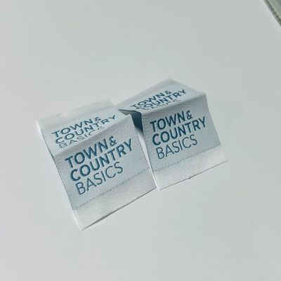 Disesuaikan menjahit pada label tenunan pakaian label pakaian 3000pcs