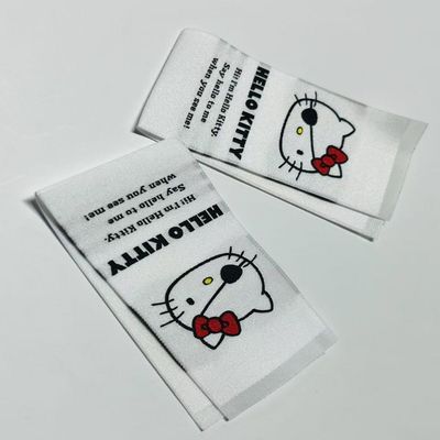 Label kain tenun jahit pada label nama melekat pada dukungan OEM