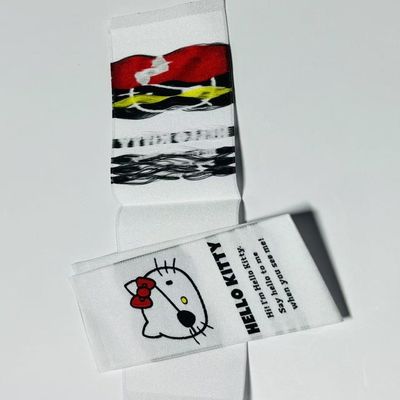 Label kain tenun jahit pada label nama melekat pada dukungan OEM