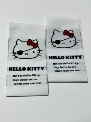 Label kain tenun jahit pada label nama melekat pada dukungan OEM