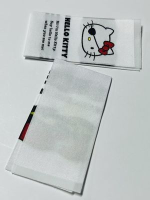 Label kain tenun jahit pada label nama melekat pada dukungan OEM