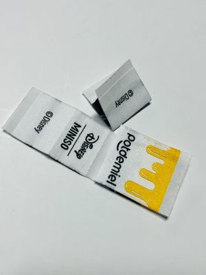 Label Pakaian Tenun Custom Label Pakaian 0.4mm Logo 5000 pcs